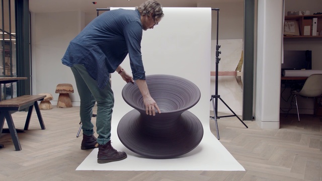 Video Reference: Furniture, Table, Balance, Art, Person