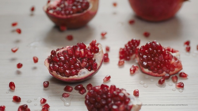 Video Reference: Food, Pomegranate, Red, Fruit, Ingredient, Superfood, Plant, Pink peppercorn, Produce, Cuisine, Person