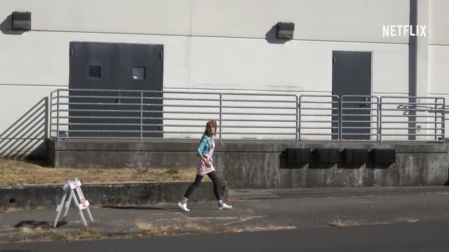 Video Reference: urban area, player, race, sport venue, structure, wall, games, race track, recreation, sports, Person