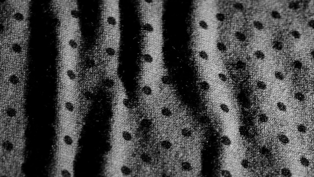 Video Reference: texture, pattern, shower curtain, surface, curtain, textured, protective covering, furnishing, blind, Person