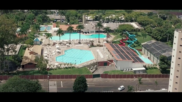 Video Reference: Residential area, Urban design, Sport venue, Aerial photography, Architecture, Stadium, Metropolitan area, Neighbourhood, Suburb, Leisure