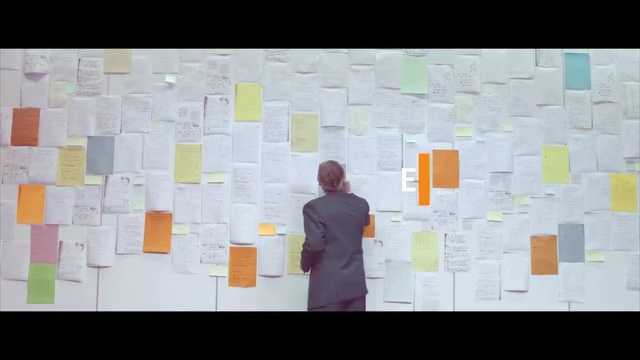 Video Reference: text, yellow, wall, material, design, product, line, font, square, pattern, Person