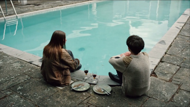 Video Reference: water, vertebrate, leisure, sitting, recreation, vacation, girl, swimming pool, fun, Person