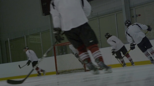 Video Reference: player, bandy, hockey, sport venue, sports, team sport, defenseman, ice hockey, ice hockey position, college ice hockey, Person