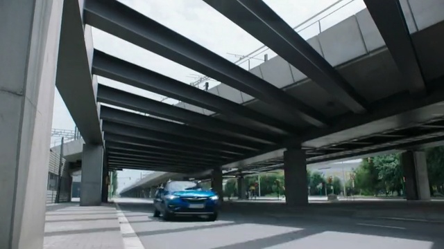 Video Reference: car, infrastructure, motor vehicle, structure, parking, automotive exterior, metropolitan area, luxury vehicle, road, family car