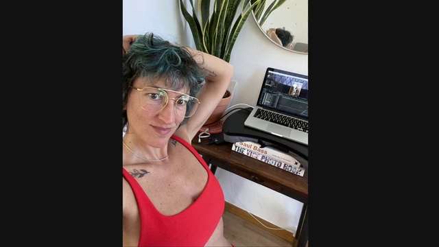 Video Reference: Shoulder, Leg, Neck, Technology, Electronic device, Hand, Room, Black hair, Chest, Selfie