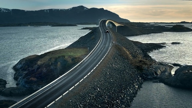 Video Reference: sea, fixed link, sky, water, coast, headland, horizon, road, coastal and oceanic landforms, ocean