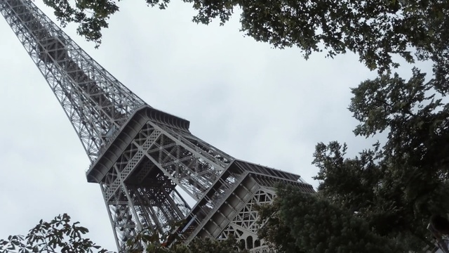 Video Reference: landmark, sky, tree, architecture, building, structure, tower, cloud, plant, Person