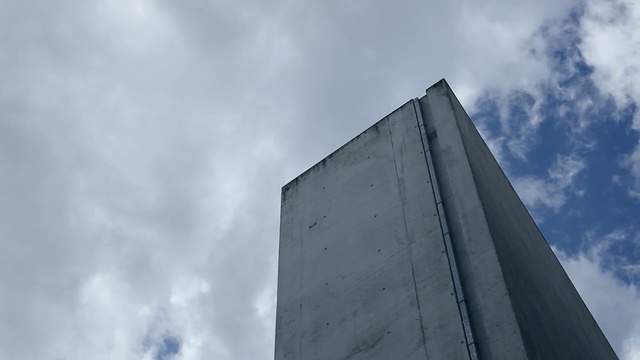 Video Reference: Blue, Sky, Daytime, Architecture, Cloud, Urban area, Metropolitan area, Skyscraper, Building, Line