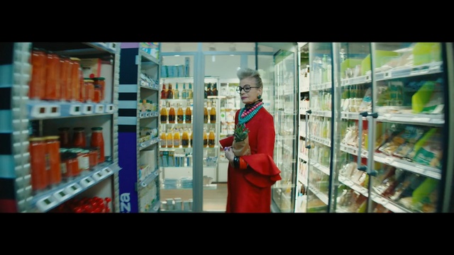 Video Reference: Supermarket, Product, Retail, Convenience store, Grocery store, Pharmacy, Service, Customer, Building, Science, Person, Indoor, Man, Looking, Standing, Photo, Holding, Front, Machine, Young, Refrigerator, Red, Food, Hand, Wearing, Shirt, Woman, Room, White, Playing, Text, Soft drink, Bottle, Clothing, Vending machine