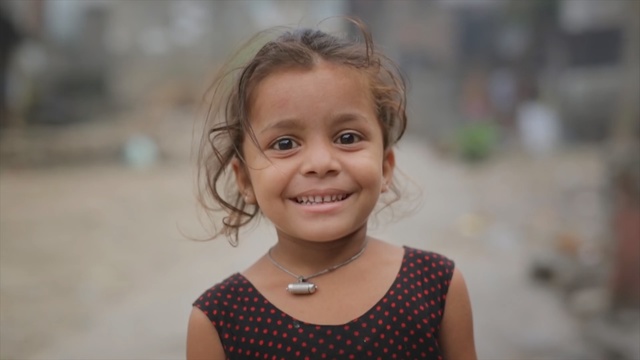 Video Reference: Face, Hair, Child, Facial expression, People, Smile, Head, Skin, Hairstyle, Chin