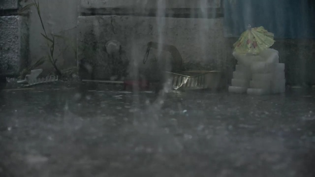 Video Reference: water, nature, mode of transport, darkness, freezing, screenshot, geological phenomenon, water feature, rain, tree, Person