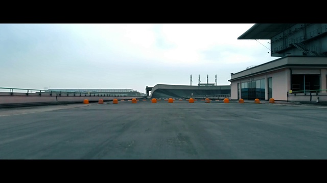Video Reference: Air travel, Asphalt, Airport, Sky, Mode of transport, Race track, Horizon, Vehicle, Architecture, Photography