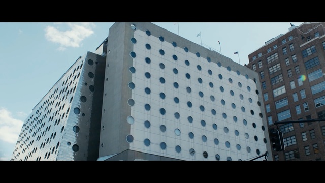 Video Reference: Architecture, Metropolitan area, Blue, Urban area, Building, Tower block, Daytime, Facade, Human settlement, Condominium