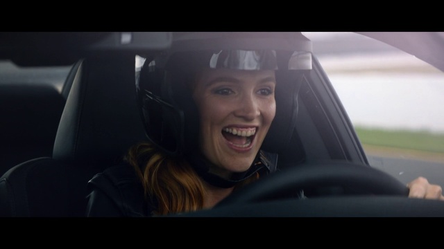 Video Reference: Face, Facial expression, Automotive design, Head, Smile, Vehicle door, Driving, Photography, Family car, Vehicle