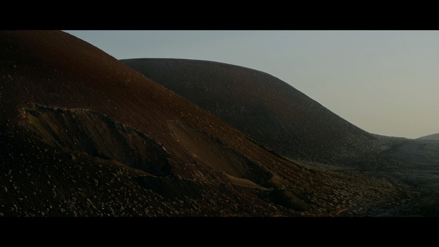Video Reference: Nature, Black, Brown, Mountainous landforms, Hill, Highland, Natural environment, Sky, Sand, Landscape