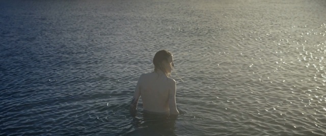 Video Reference: water, sea, ocean, horizon, sky, calm, water resources, wave, sunlight, reflection, Person