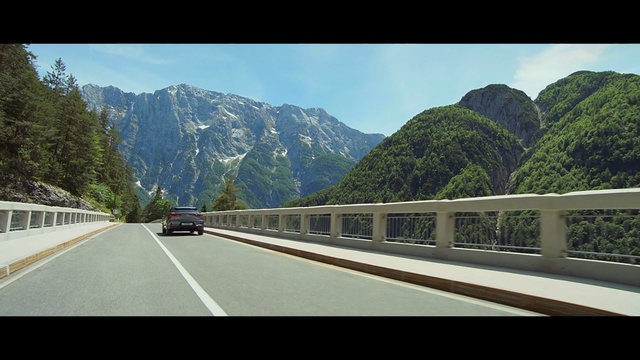Video Reference: Mountainous landforms, Road, Highway, Mountain, Natural landscape, Mountain range, Transport, Freeway, Mode of transport, Mountain pass
