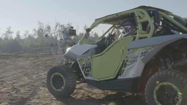 Video Reference: car, vehicle, motor vehicle, automotive tire, tire, off roading, off road racing, automotive wheel system, wheel, off road vehicle, Person