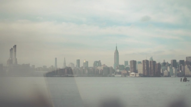 Video Reference: skyline, city, daytime, skyscraper, cityscape, sky, urban area, metropolitan area, metropolis, haze