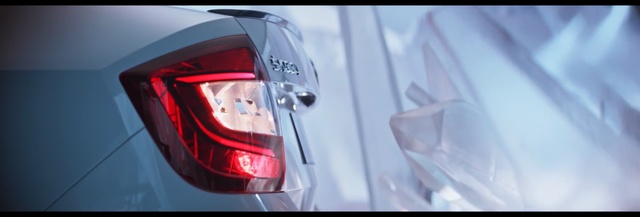 Video Reference: Automotive lighting, Automotive tail & brake light, Vehicle, Car, Automotive design, Vehicle door, Light, Automotive exterior, Trunk, Mid-size car, Red, Table, Sitting, Monitor, Computer, Screen, Mirror, Man, Train, Laptop, White, Desk, Keyboard, Holding, Oven, Riding, Kitchen, Helmet, Auto part