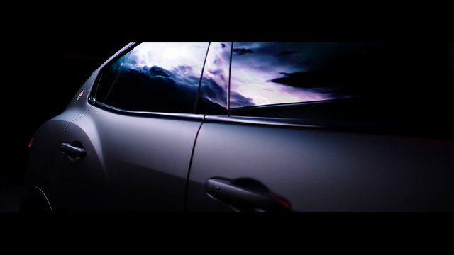 Video Reference: car, motor vehicle, black, vehicle, automotive design, automotive lighting, mode of transport, vehicle door, light, photography