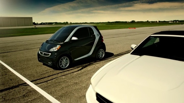 Video Reference: Land vehicle, Vehicle, Car, Motor vehicle, City car, Automotive design, Vehicle door, Mode of transport, Hatchback, Subcompact car, Person