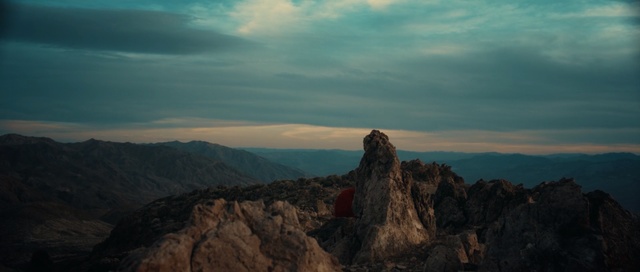 Video Reference: Sky, Mountainous landforms, Nature, Mountain, Rock, Mountain range, Cloud, Horizon, Ridge, Hill, Outdoor, Valley, View, Background, Rocky, Overlooking, Clouds, Standing, Large, Flying, Plane, High, Covered, Field, Man, Snow, Cloudy, Skiing, Airplane, Grazing, Air, Slope, Landscape, Canyon, Desert, Hillside