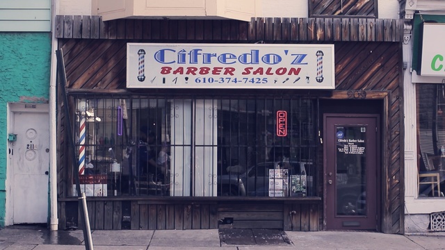 Video Reference: city, street, facade, building, window, signage, Person