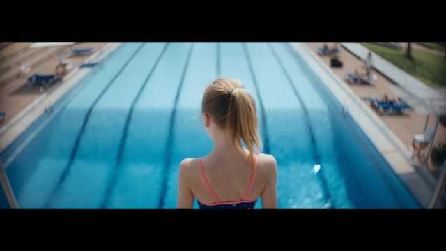 Video Reference: Hair, Photograph, Blue, Swimming pool, Fun, Leisure, Beauty, Blond, Snapshot, Water, Person, Laptop, Woman, Screen, Monitor, Computer, Young, Sitting, Holding, Looking, Front, Girl, Standing, Watching, Television, Using, Board, Female, Man, Surfing, Keyboard, Playing, Room, Wave, Laying, Bed, White, Riding, Swimming, Clothing, Human face