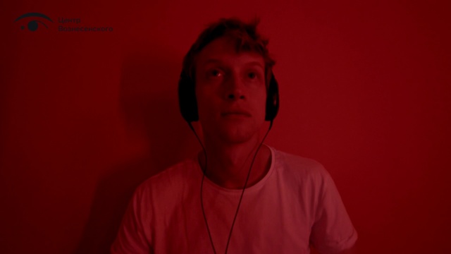 Video Reference: Red, Face, Black, Head, Audio equipment, Maroon, Cheek, Chin, Human, Mouth