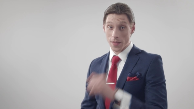 Video Reference: White, Red, Suit, Tie, White-collar worker, Standing, Businessperson, Formal wear, Job, Photography