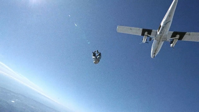 Video Reference: Airplane, Sky, Aerospace engineering, Parachuting, Vehicle, Aircraft, Aviation, Atmosphere, Parachute, Air sports