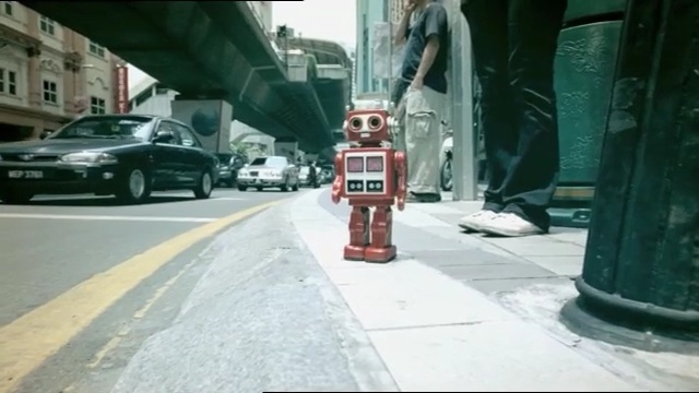 Video Reference: Mode of transport, Motor vehicle, Lane, Asphalt, Sidewalk, Road, Vehicle, Urban area, Street, Infrastructure