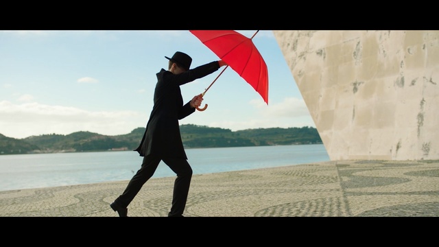 Video Reference: Umbrella, Fashion accessory, Sky, Photography, Recreation, Vacation, Tourism