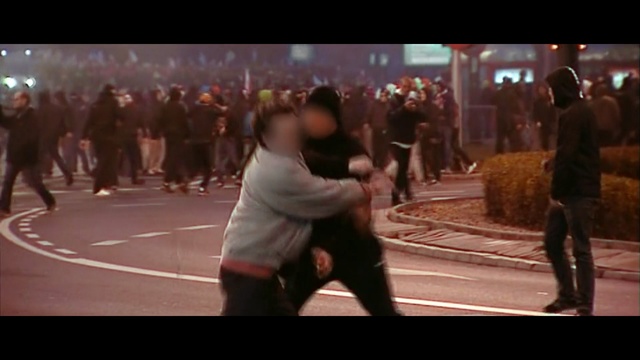 Video Reference: People, Crowd, Snapshot, Photography, Interaction, Fun, Street dance, Performance, Kung fu, Pedestrian, Person, Road, Game, Man, Riding, Board, Basketball, Street, Holding, Walking, Large, Standing, Young, Woman, Group, City, Playing, Ball, Traffic, White, Train, Court, Sign, Trick, Player, Doing, Dance, Sport, Footwear