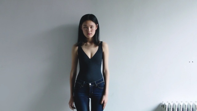Video Reference: fashion model, girl, black hair, leg, thigh, long hair, photo shoot, model, neck, brown hair, Person
