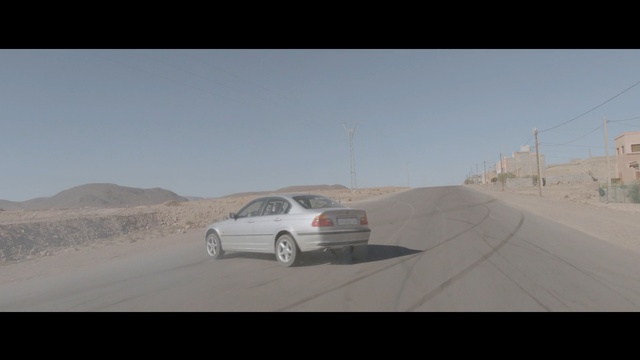 Video Reference: car, motor vehicle, road, landscape, minivan, travel, sky, passenger van, highway, transportation, drive, truck, clouds, van