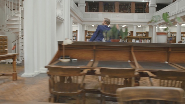 Video Reference: furniture, table, interior design, flooring, Person