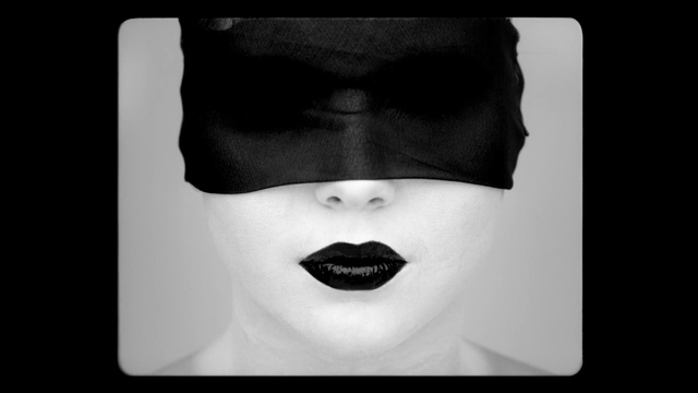 Video Reference: Face, White, Lip, Black, Nose, Head, Eyebrow, Black-and-white, Moustache, Chin