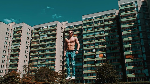 Video Reference: Urban area, Metropolitan area, Condominium, Tower block, Green, Architecture, Residential area, Human settlement, City, Barechested, Person