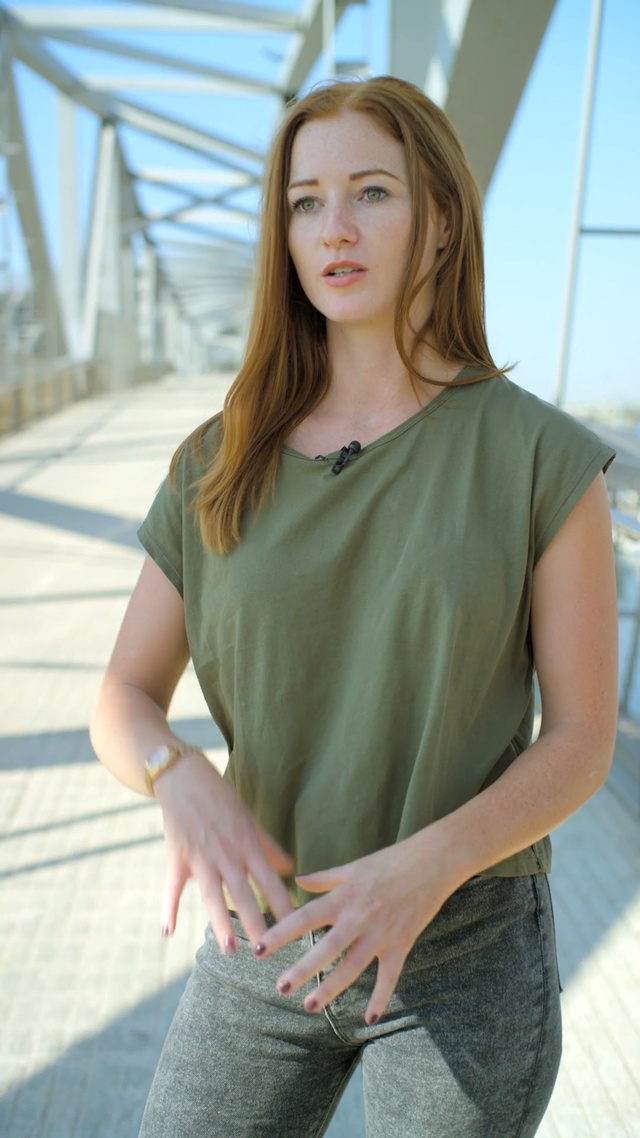 Video Reference: Hair, Clothing, Beauty, Khaki, Neck, Hairstyle, Blond, Sleeve, Long hair, Fashion, Person