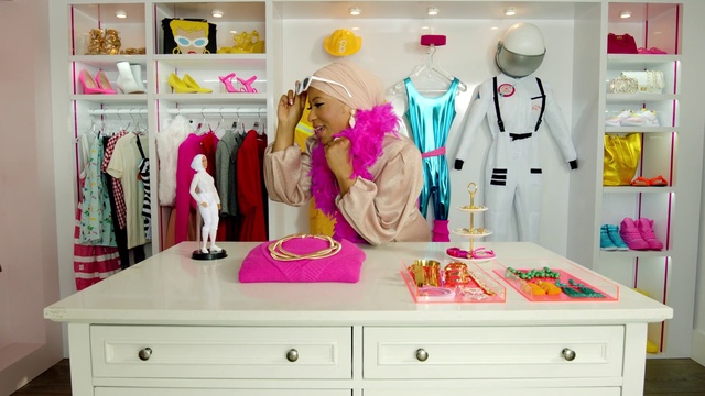 Video Reference: Photograph, Cabinetry, White, Purple, Textile, Sleeve, Interior design, Yellow, Pink, Drawer