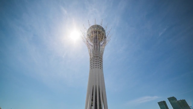 Video Reference: landmark, daytime, tower, sky, skyscraper, building, tourist attraction, cloud, tree, metropolis