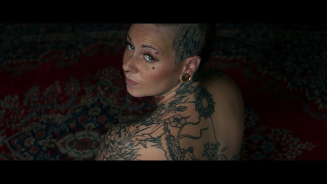 Video Reference: Tattoo, Face, Black, Skin, Head, Lady, Cheek, Eyebrow, Nose, Beauty, Person