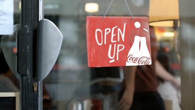 Video Reference: cola, coca cola, carbonated soft drinks, drink, soft drink, advertising, street, signage