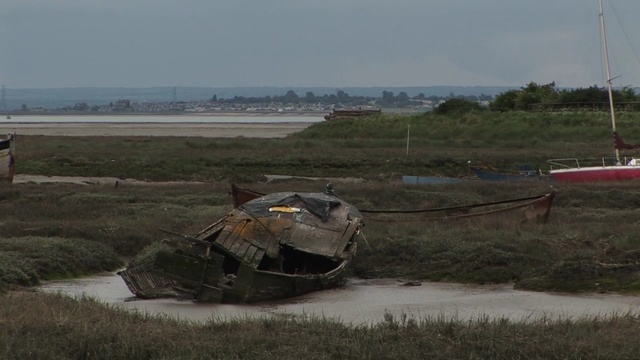 Video Reference: waterway, water, vehicle, wetland, marsh, river, boat, coast, sky, ecoregion