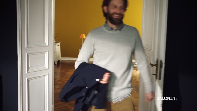 Video Reference: Standing, Shoulder, Outerwear, Facial hair, T-shirt, Sleeve, Room, Beard, Neck, Formal wear, Person