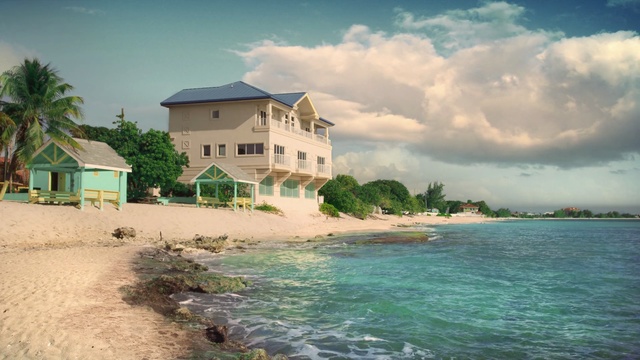 Video Reference: water, villa, landscape, travel, vacation, beach, shore, sky, ocean, sea, resort, coast, summer, tourism, tree, river, house, island