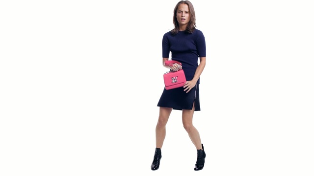 Video Reference: Clothing, T-shirt, Fashion, Footwear, Standing, Sleeve, Joint, Knee, Dress, Skort, Person